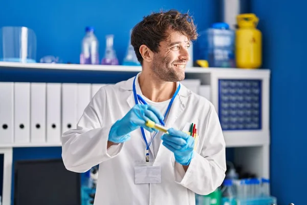 Young Man Scientist Smiling Confident Writing Test Tube Laboratory — Stockfoto