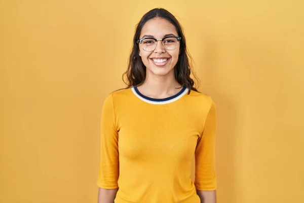 Young Brazilian Woman Wearing Glasses Yellow Background Looking Positive Happy — Stockfoto