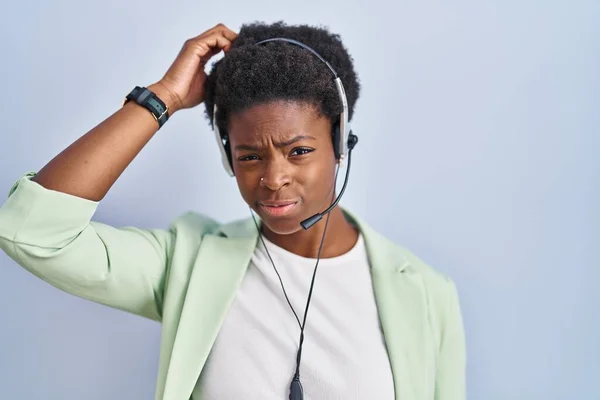 African American Woman Wearing Call Center Agent Headset Confuse Wondering — Fotografia de Stock