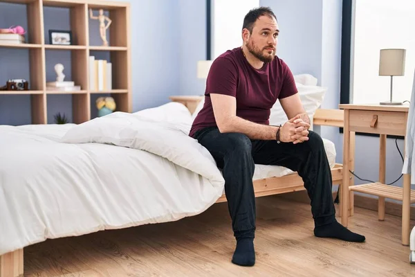 Young Hispanic Man Sitting Bed Sad Expression Bedroom — Foto de Stock