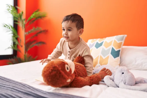 Adorable Hispanic Toddler Smiling Confident Sitting Bed Bedroom — Stok fotoğraf