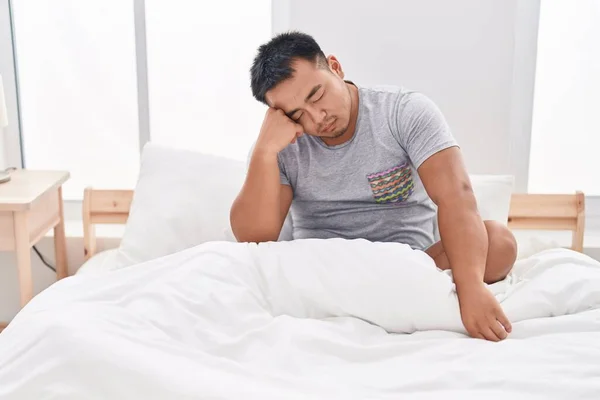 Young Chinese Man Stressed Sitting Bed Bedroom — Stockfoto