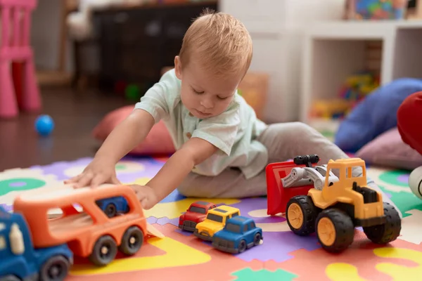 Adorable Toddler Playing Car Toy Sitting Floor Kindergarten — Stok fotoğraf
