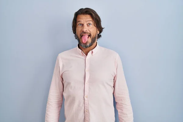 Handsome Middle Age Man Wearing Elegant Shirt Background Sticking Tongue — Stockfoto