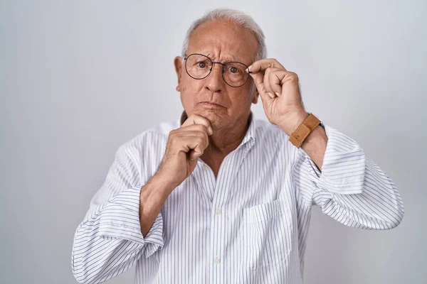 Senior Man Grey Hair Holding Glasses Hand Serious Face Thinking — Photo
