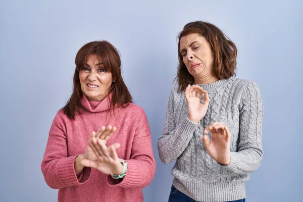 Mother Daughter Standing Blue Background Disgusted Expression Displeased Fearful Doing — Stock Photo, Image