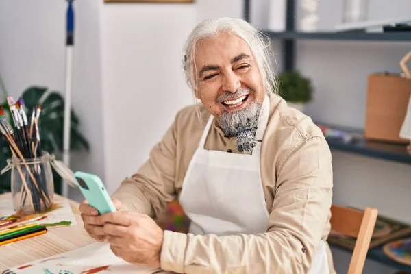 Middle Age Grey Haired Man Artist Smiling Confident Using Smartphone —  Fotos de Stock