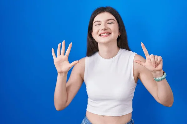 Young Caucasian Woman Standing Blue Background Showing Pointing Fingers Number — Stock Photo, Image