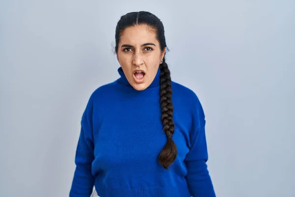 Young Hispanic Woman Standing Isolated Background Shock Face Looking Skeptical — Stock Photo, Image