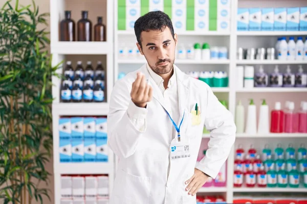 Handsome Hispanic Man Working Pharmacy Drugstore Doing Italian Gesture Hand — Zdjęcie stockowe