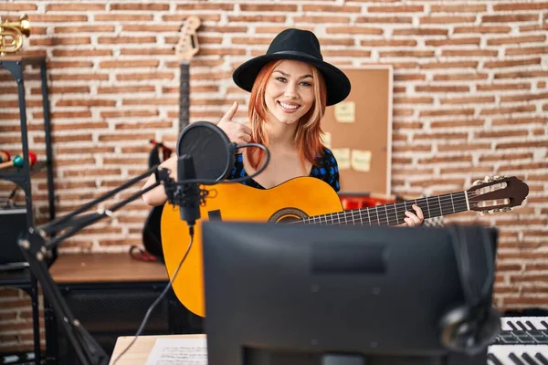Young Caucasian Woman Playing Classic Guitar Music Studio Smiling Happy — Stock Photo, Image