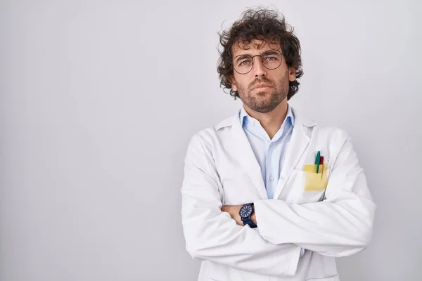Hispanic Young Man Wearing Doctor Uniform Skeptic Nervous Disapproving Expression —  Fotos de Stock