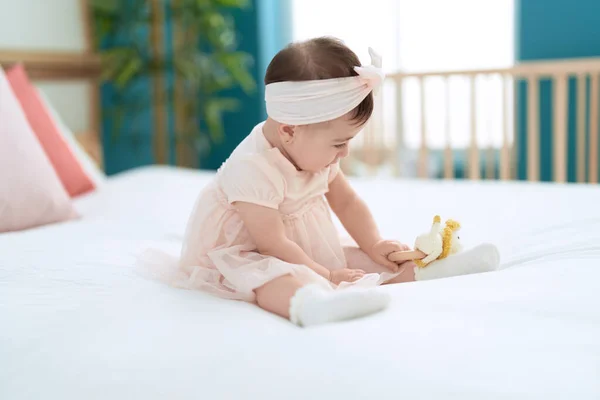 Adorable Toddler Playing Toys Sitting Bed Bedroom — Stock Photo, Image