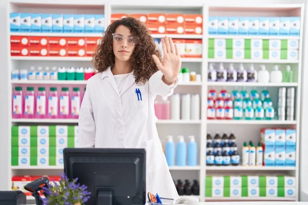 Hispanic Woman Curly Hair Working Pharmacy Drugstore Doing Stop Sing — Stock Photo, Image