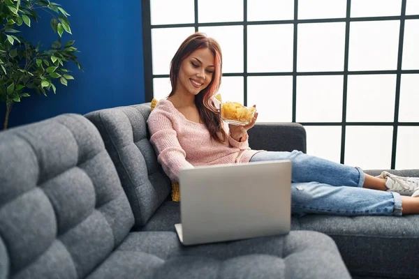 Young Caucasian Woman Watching Movie Eating Chips Potatoes Home — Stock Photo, Image