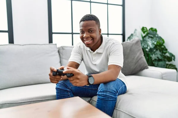 Young African Man Playing Video Games Home — Foto Stock