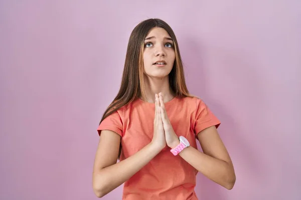 Teenager Girl Standing Pink Background Begging Praying Hands Together Hope — Foto de Stock