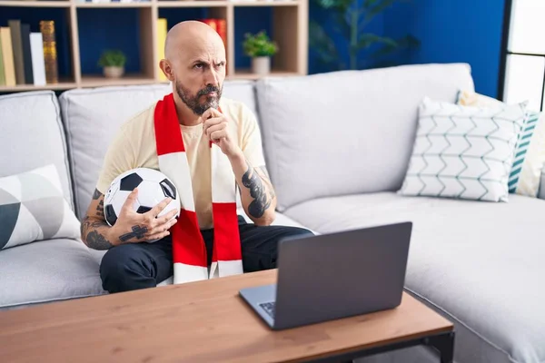 Hispanic Man Tattoos Watching Football Match Hooligan Holding Ball Laptop — Stockfoto