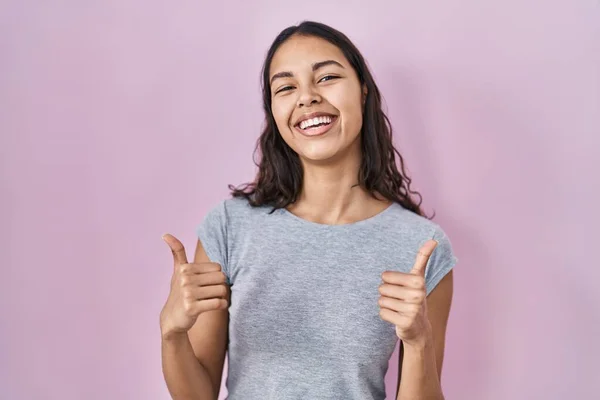 Young Brazilian Woman Wearing Casual Shirt Pink Background Success Sign — Stockfoto