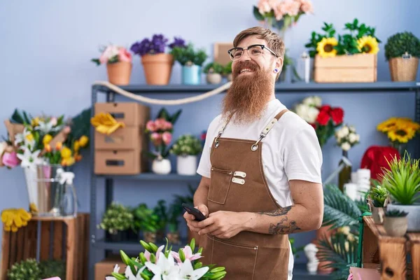 Young Redhead Man Florist Smiling Confident Using Smartphone Flower Shop — Fotografia de Stock