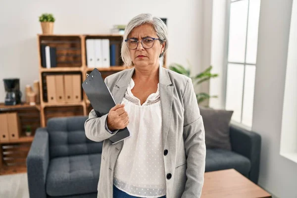 Middle Age Woman Grey Hair Consultation Office Skeptic Nervous Frowning — Stockfoto