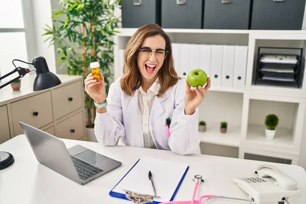 Young Woman Working Dietitian Clinic Winking Looking Camera Sexy Expression — Foto Stock