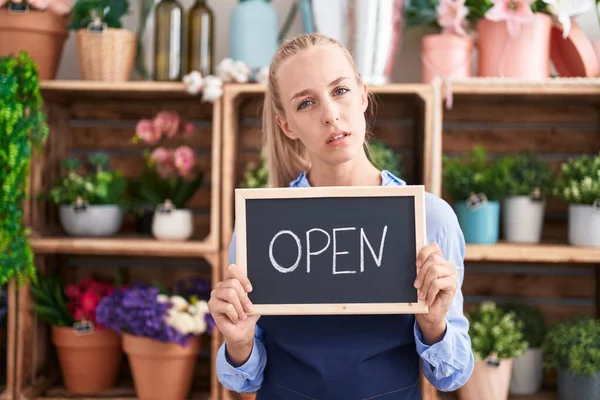 Young Caucasian Woman Working Florist Holding Open Sign Clueless Confused — Stockfoto