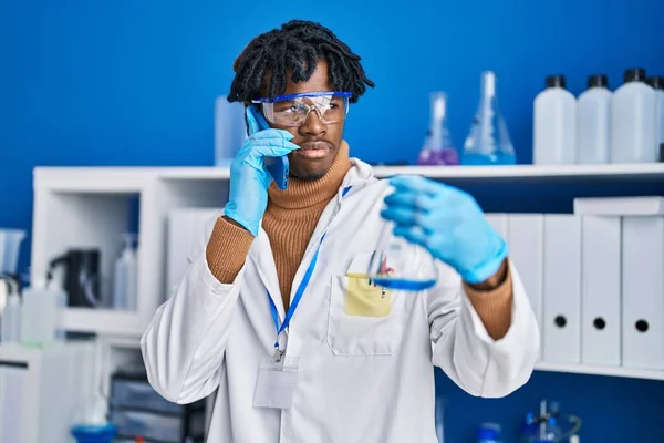 African American Man Scientist Talking Smartphone Holding Test Tube Laboratory — Fotografia de Stock