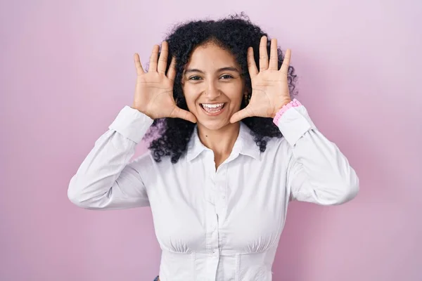 Hispanic Woman Curly Hair Standing Pink Background Smiling Cheerful Playing — Stock Photo, Image