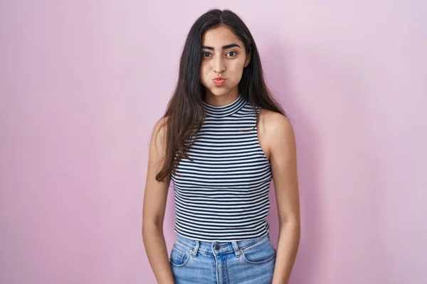 Young Teenager Girl Wearing Casual Striped Shirt Puffing Cheeks Funny — Photo