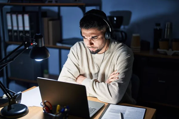 Young Handsome Man Working Using Computer Laptop Night Skeptic Nervous — Stockfoto