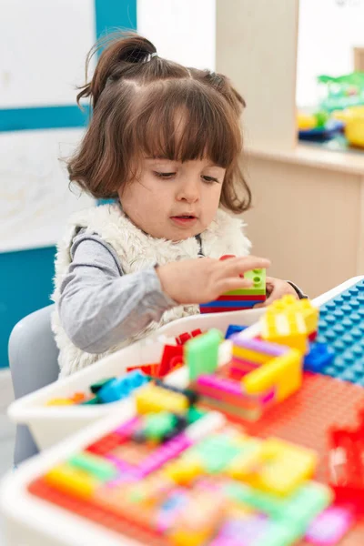 Adorable Hispanic Toddler Playing Construction Blocks Sitting Table Kindergarten — Stock Photo, Image