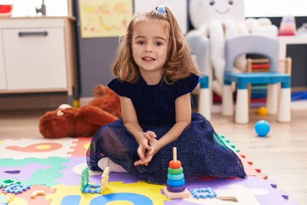 Adorable Hispanic Girl Smiling Confident Sitting Floor Kindergarten — Stok fotoğraf