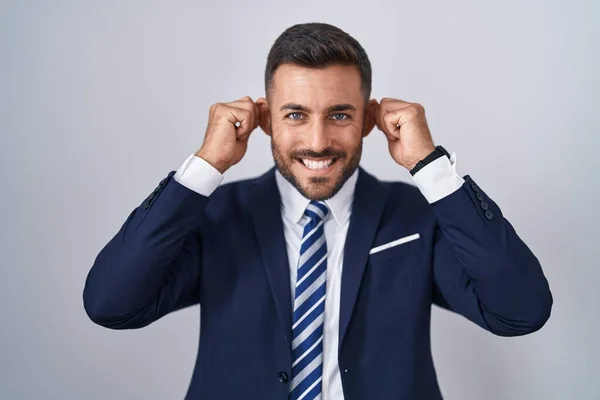 Handsome Hispanic Man Wearing Suit Tie Smiling Pulling Ears Fingers — Foto de Stock