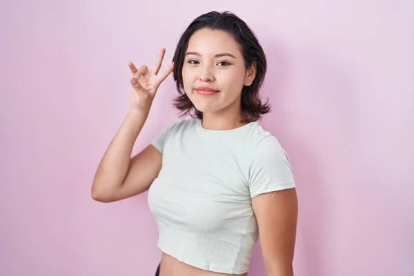 Hispanic Young Woman Standing Pink Background Smiling Looking Camera Showing — Stockfoto
