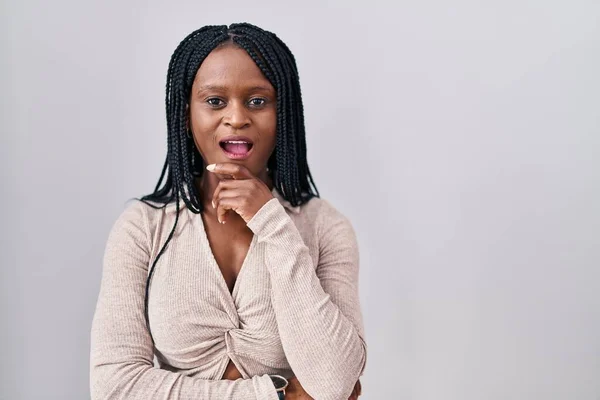 African Woman Braids Standing White Background Looking Fascinated Disbelief Surprise — Fotografia de Stock