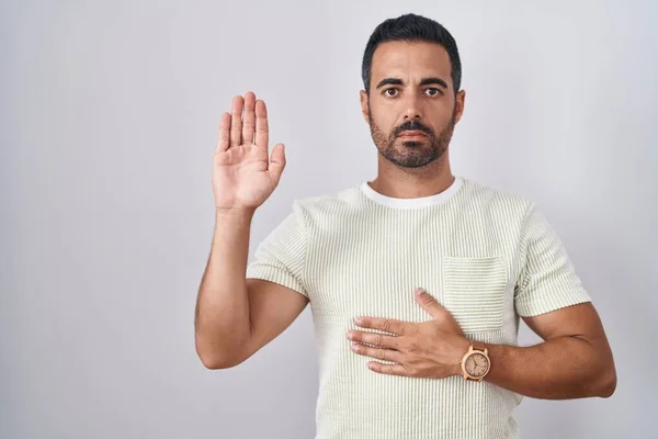 Hispanic Man Beard Standing Isolated Background Swearing Hand Chest Open — Fotografia de Stock