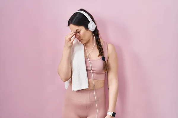 Young Brunette Woman Wearing Sportswear Headphones Tired Rubbing Nose Eyes — Photo