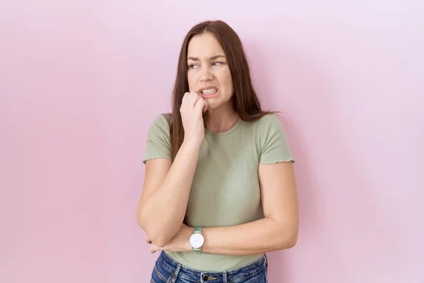 Beautiful Brunette Woman Standing Pink Background Looking Stressed Nervous Hands — Foto Stock