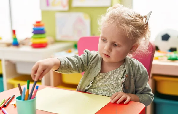 Adorable Blonde Girl Preschool Student Sitting Table Drawing Paper Kindergarten — 스톡 사진