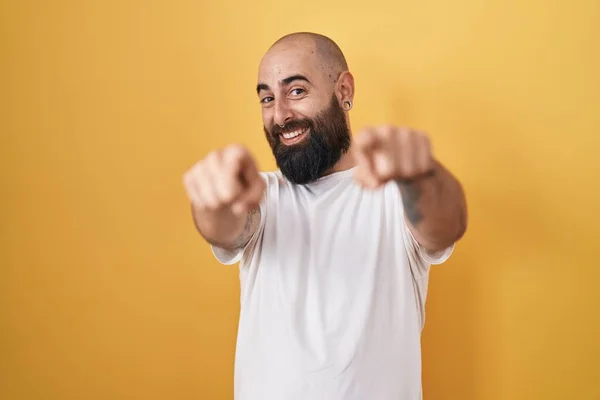 Young Hispanic Man Beard Tattoos Standing Yellow Background Pointing You —  Fotos de Stock