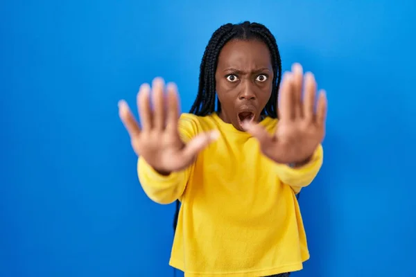 Beautiful Black Woman Standing Blue Background Doing Stop Gesture Hands — Fotografia de Stock