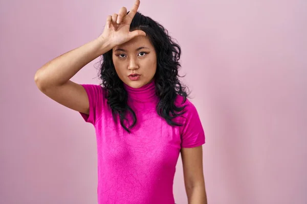 Young Asian Woman Standing Pink Background Making Fun People Fingers — Stock fotografie