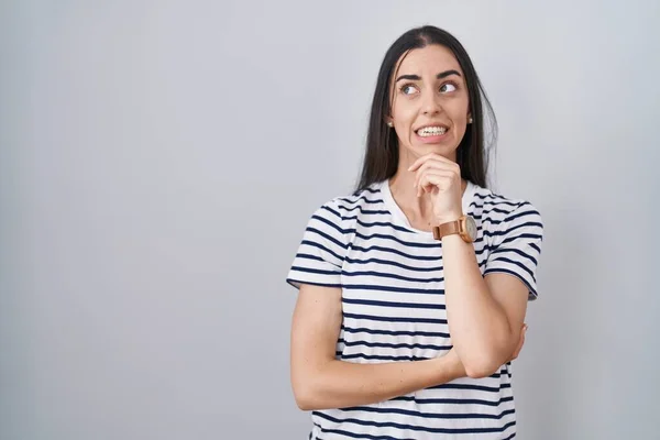 Young Brunette Woman Wearing Striped Shirt Thinking Worried Question Concerned — Foto de Stock