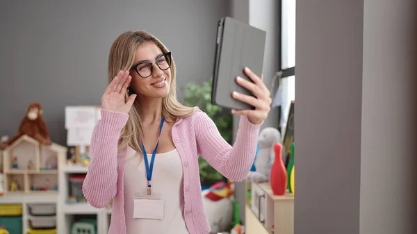 Young Blonde Woman Teacher Smiling Confident Having Video Call Kindergarten — ストック写真