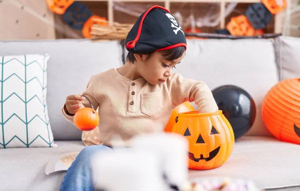 Adorable Hispanic Boy Having Halloween Party Holding Pumpkin Basket Home — Foto Stock