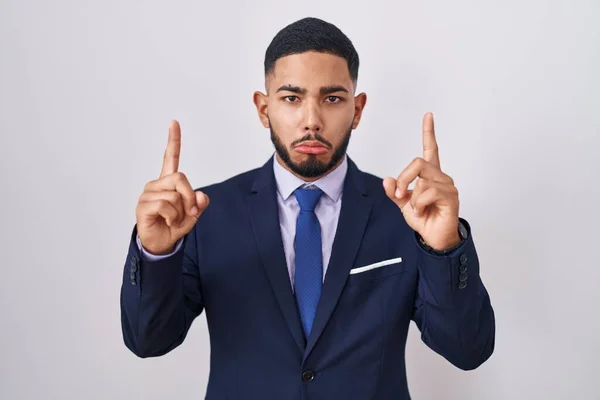 Young Hispanic Man Wearing Business Suit Tie Pointing Looking Sad — Stock Photo, Image
