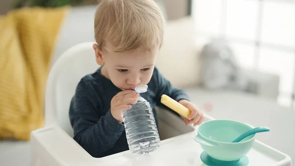 Adorable Blond Toddler Sitting Highchair Eating Snack Drinking Water Home — Stock Photo, Image