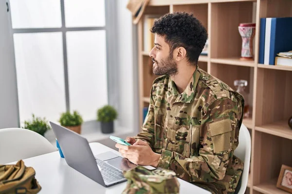 Young Arab Man Army Soldier Using Laptop Using Smartphone Home — Stock Photo, Image