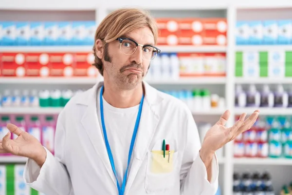 Caucasian Man Mustache Working Pharmacy Drugstore Clueless Confused Expression Arms — Stockfoto